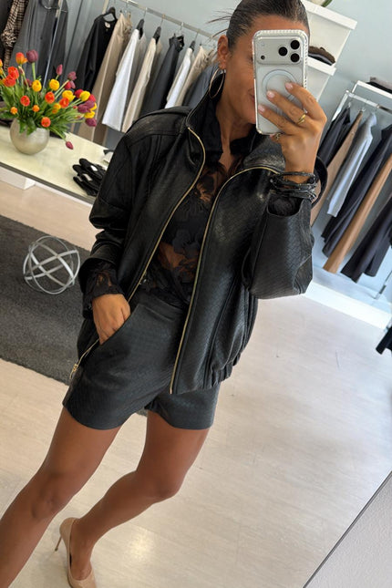 Bomber nero in ecopelle intrecciata kk