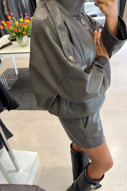 Bomber piombo in ecopelle intrecciata kk