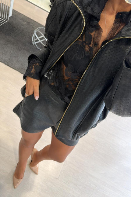 Shorts nero in ecopelle intrecciata kk