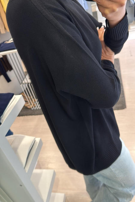 Scollo barca over nero